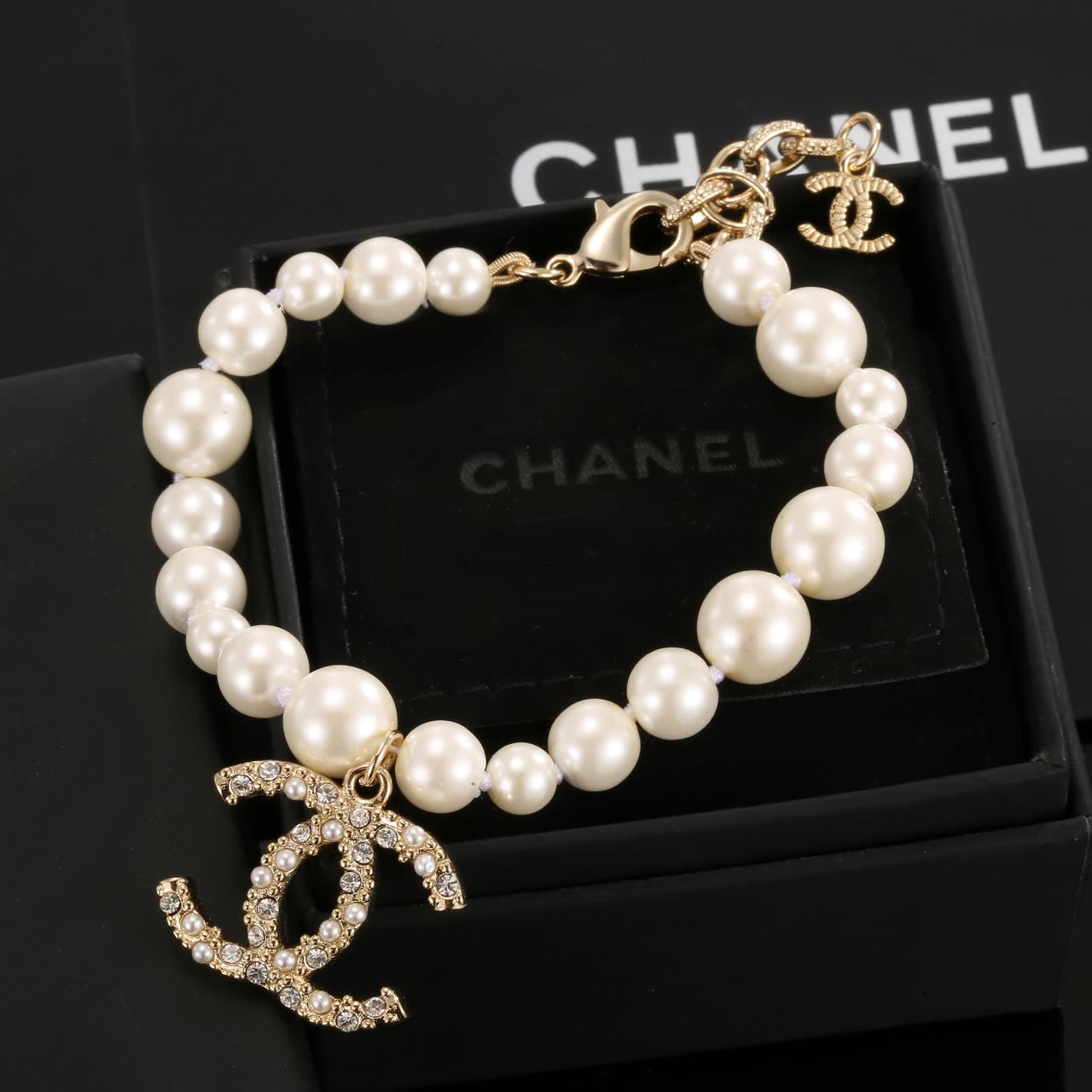 Chanel Pearl Bracelet with CC Logo Charm Chanel Pearl Bracelet with CC Logo Charm