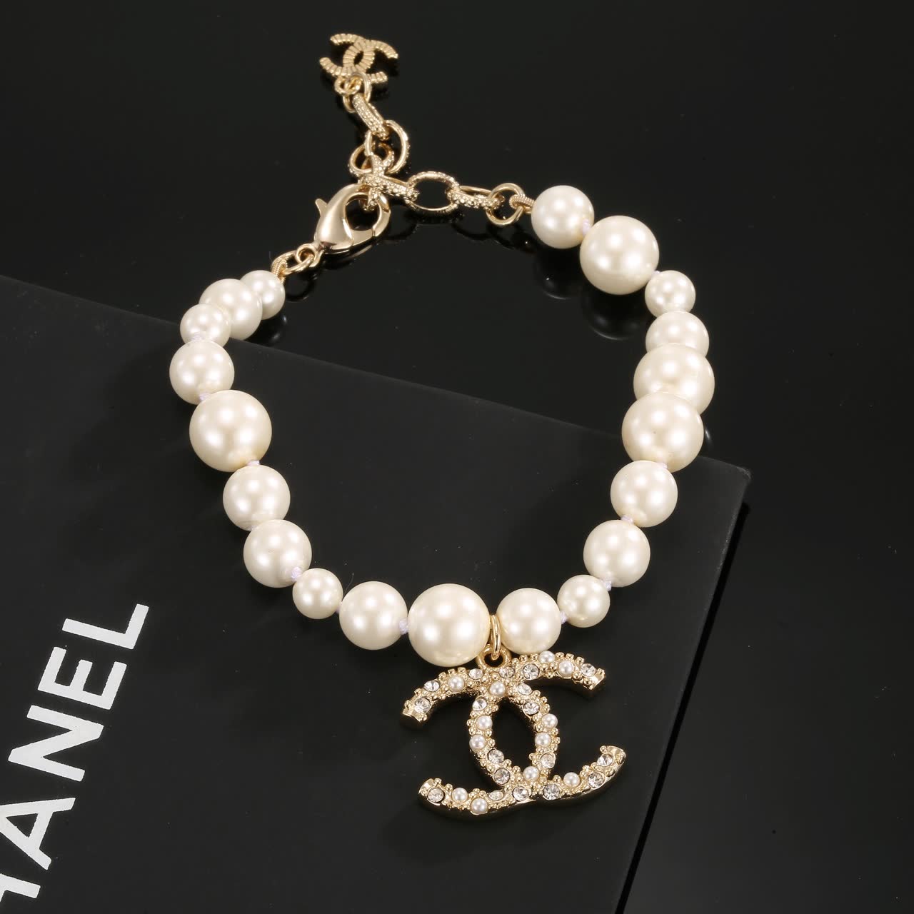 Chanel Pearl Bracelet with CC Logo Charm