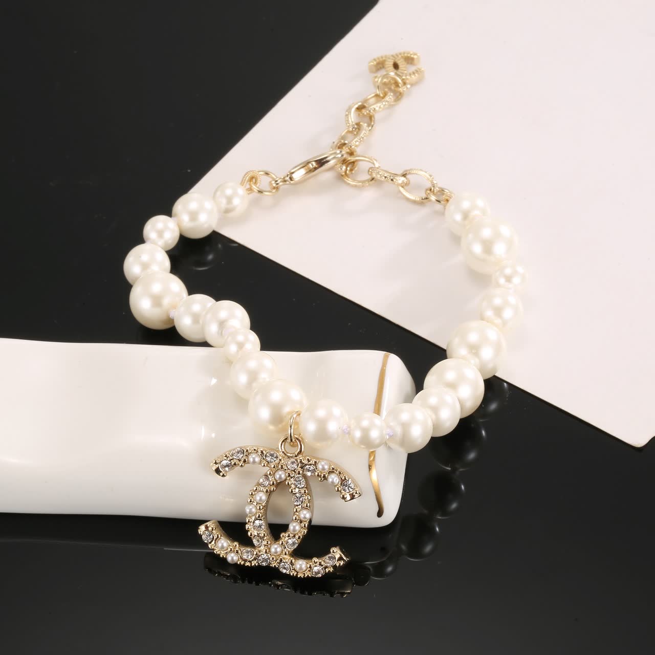Chanel Pearl Bracelet with CC Logo Charm
