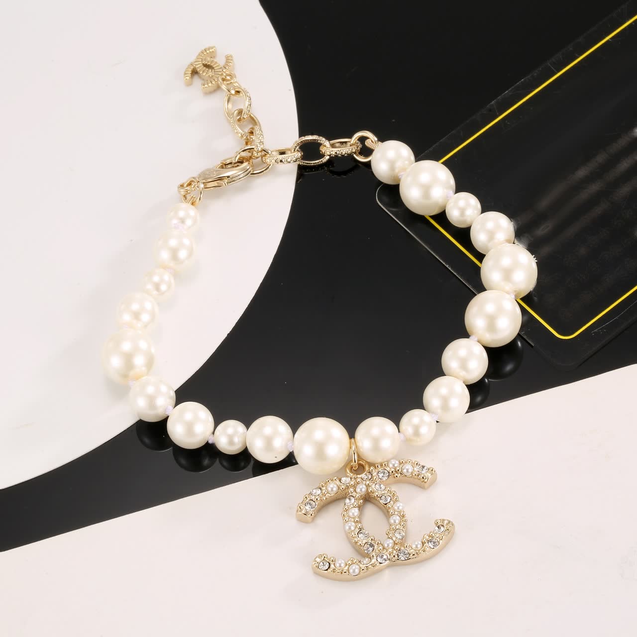 Chanel Pearl Bracelet with CC Logo Charm