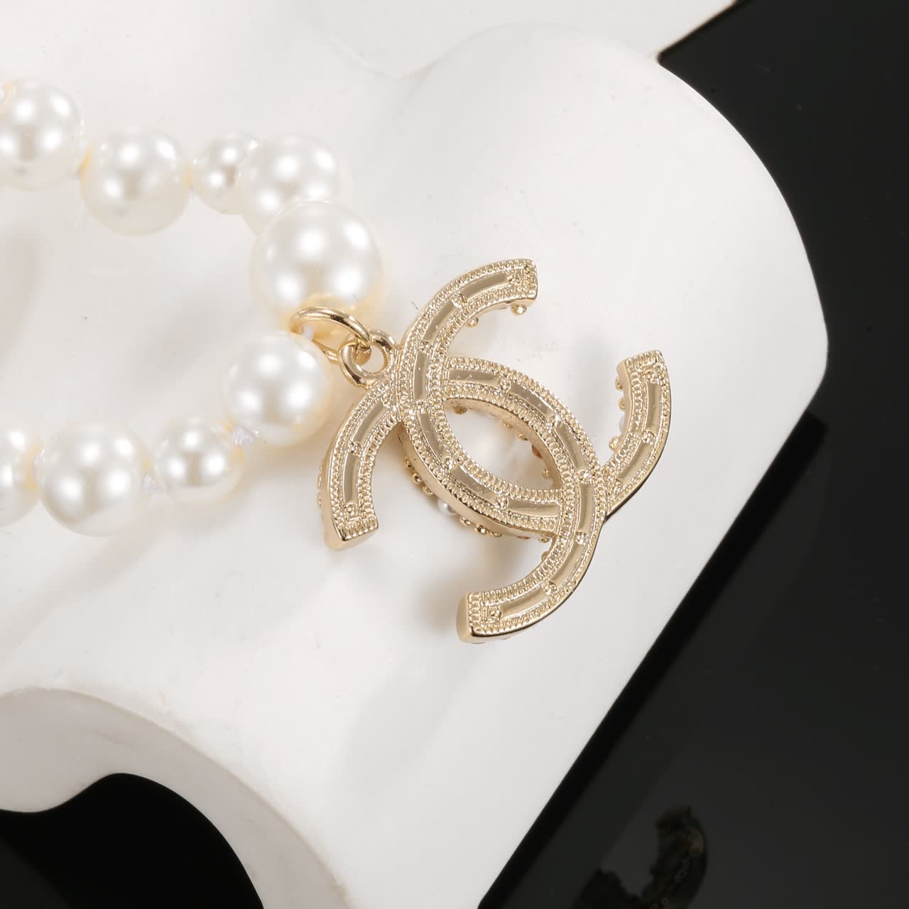 Chanel Pearl Bracelet with CC Logo Charm