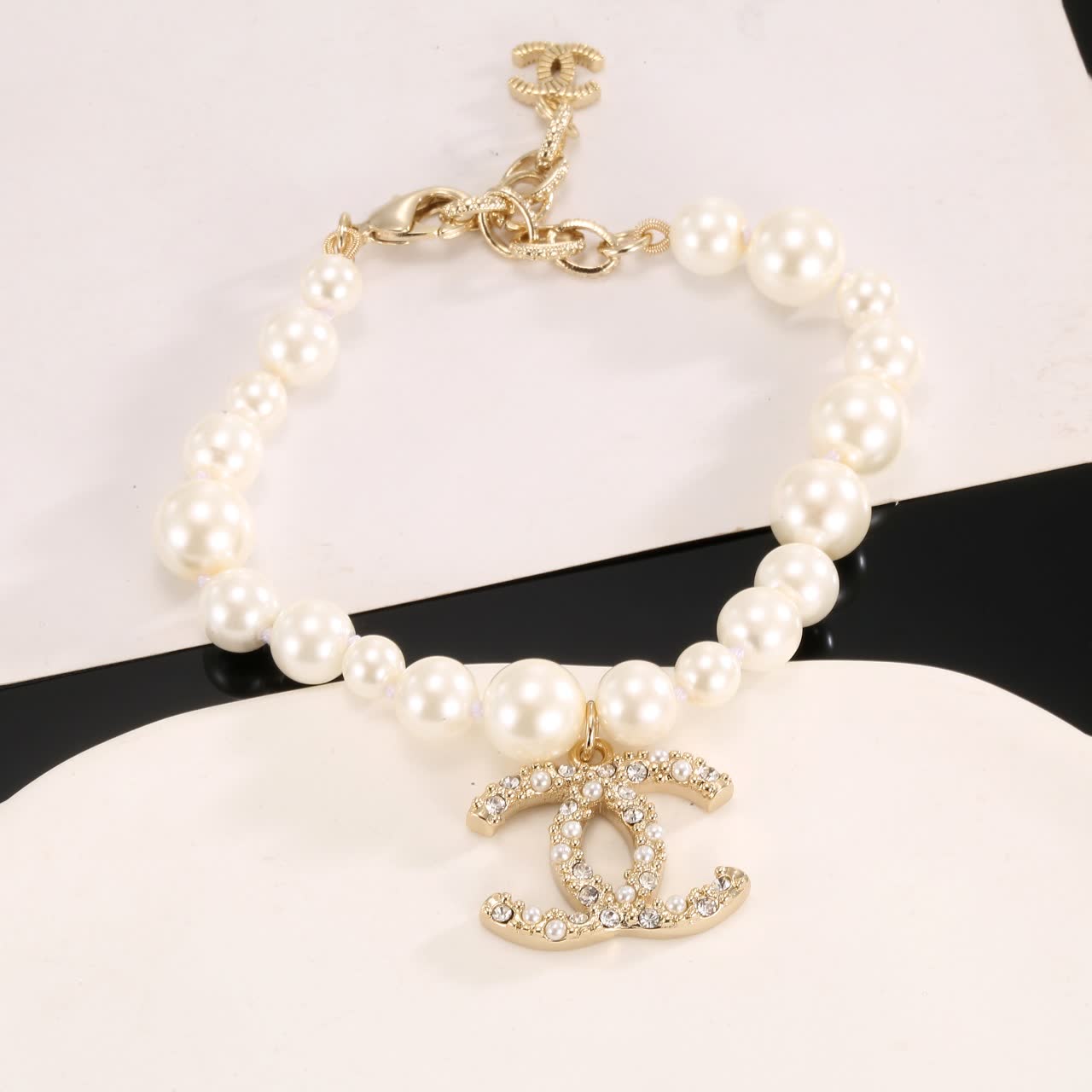 Chanel Pearl Bracelet with CC Logo Charm