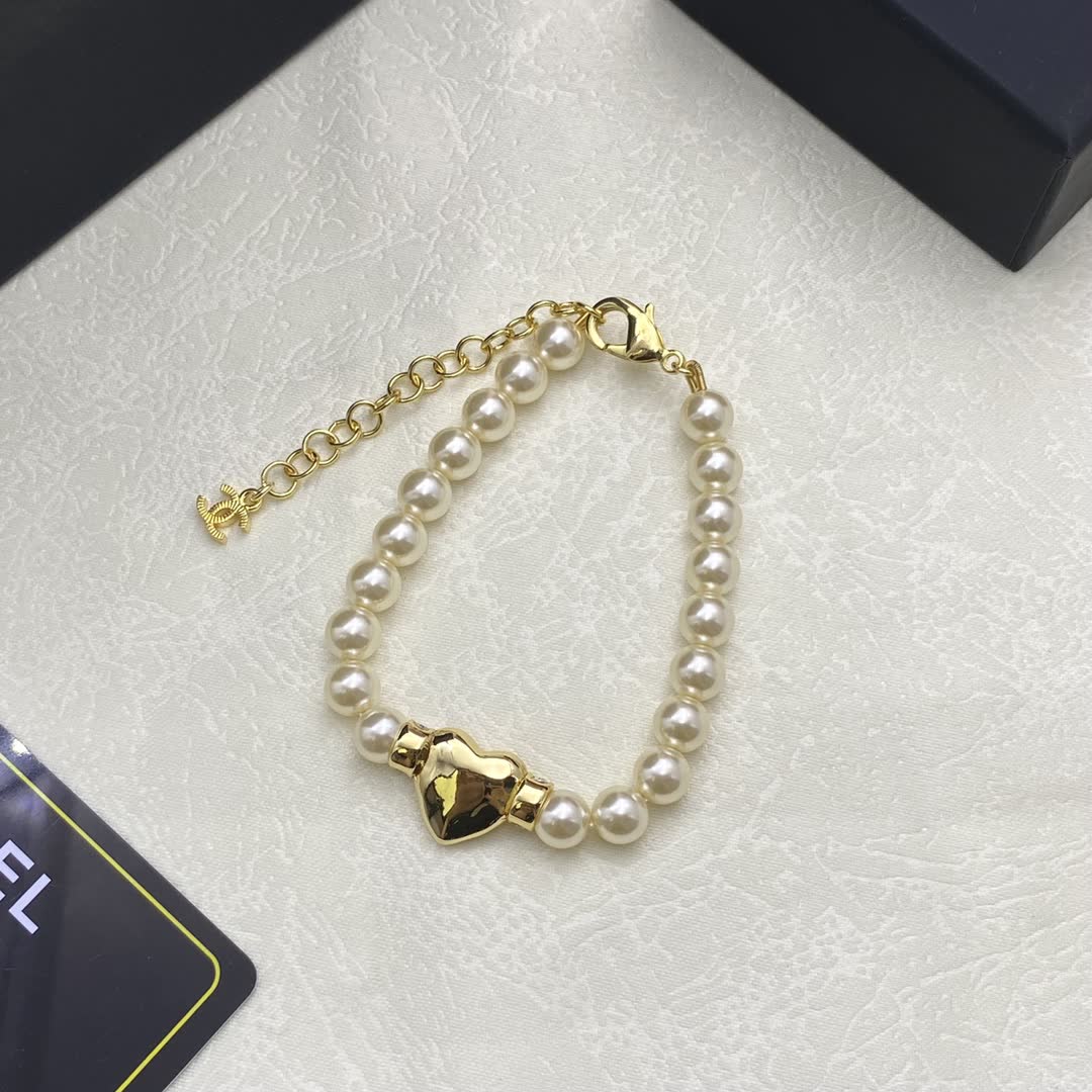 Chanel Pearl Bracelet with Gold CC Logo