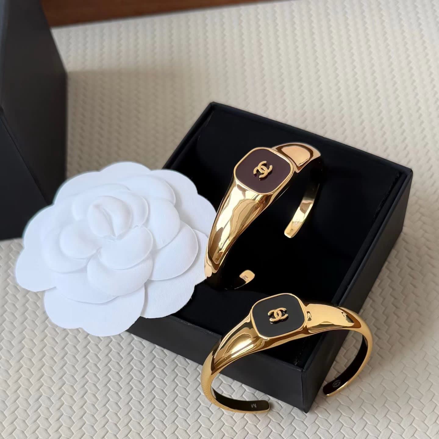 Chanel Gold Tone Bracelet with Black Enamel CC Logo