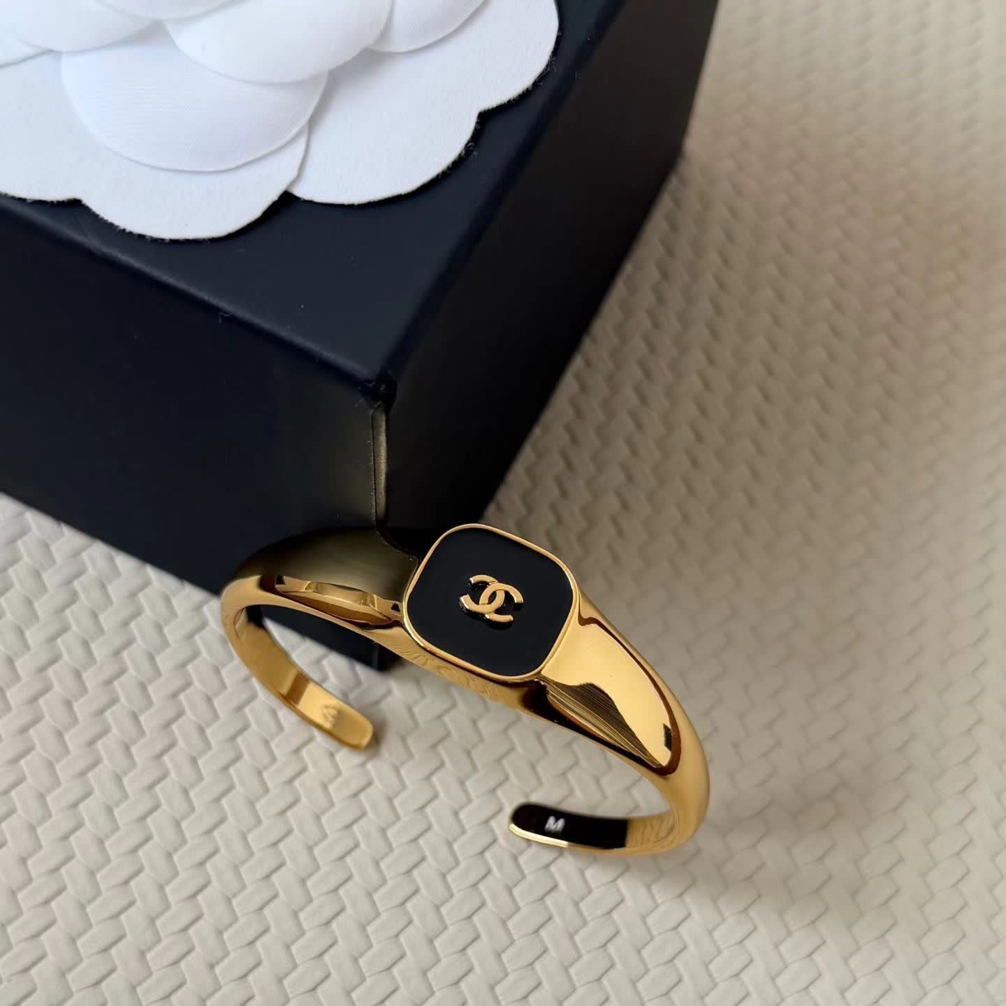 Chanel Gold Tone Bracelet with Black Enamel CC Logo