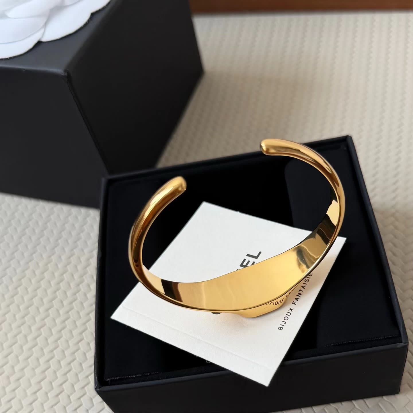 Chanel Gold Tone Bracelet with Black Enamel CC Logo