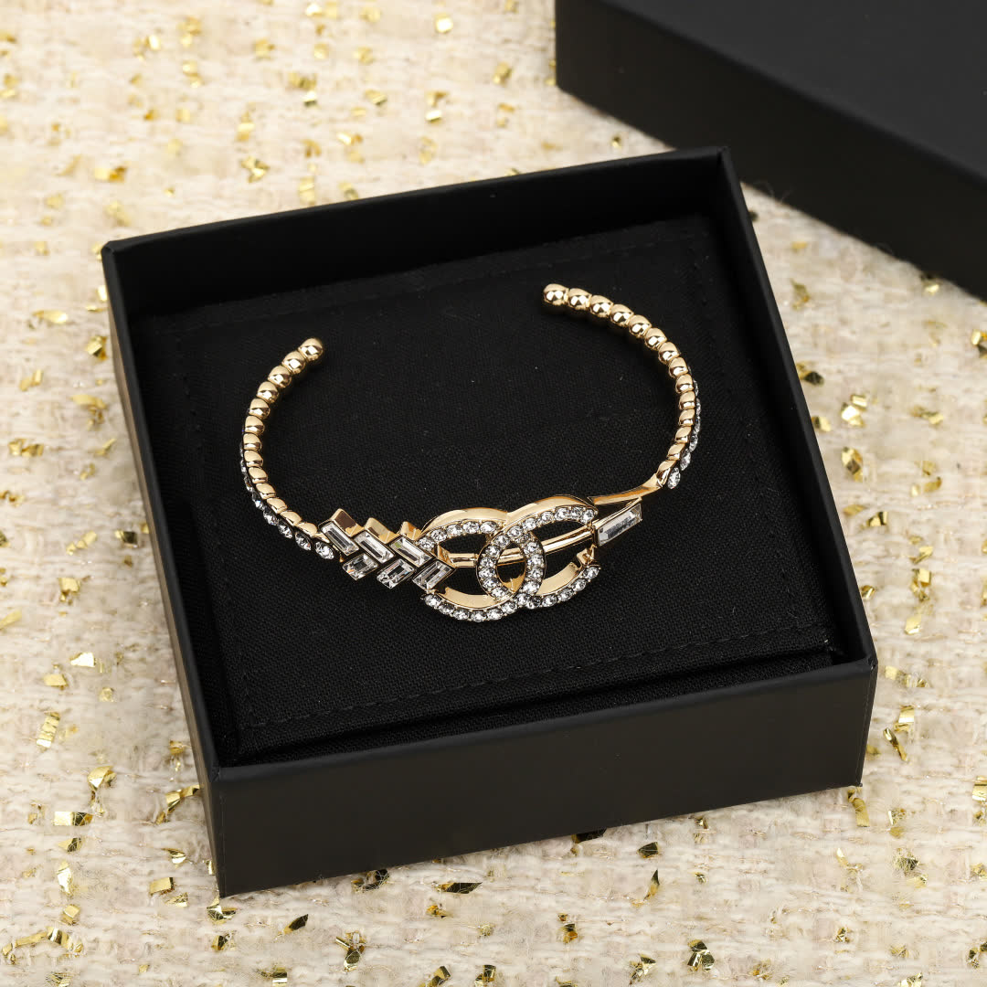 Chanel Gold Tone Bracelet with Diamonds