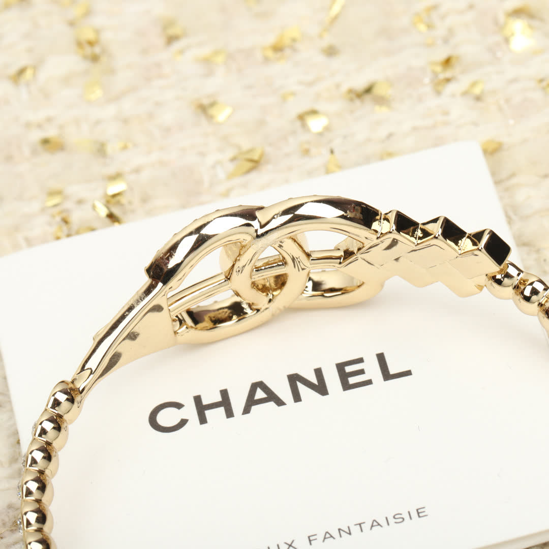 Chanel Gold Tone Bracelet with Diamonds