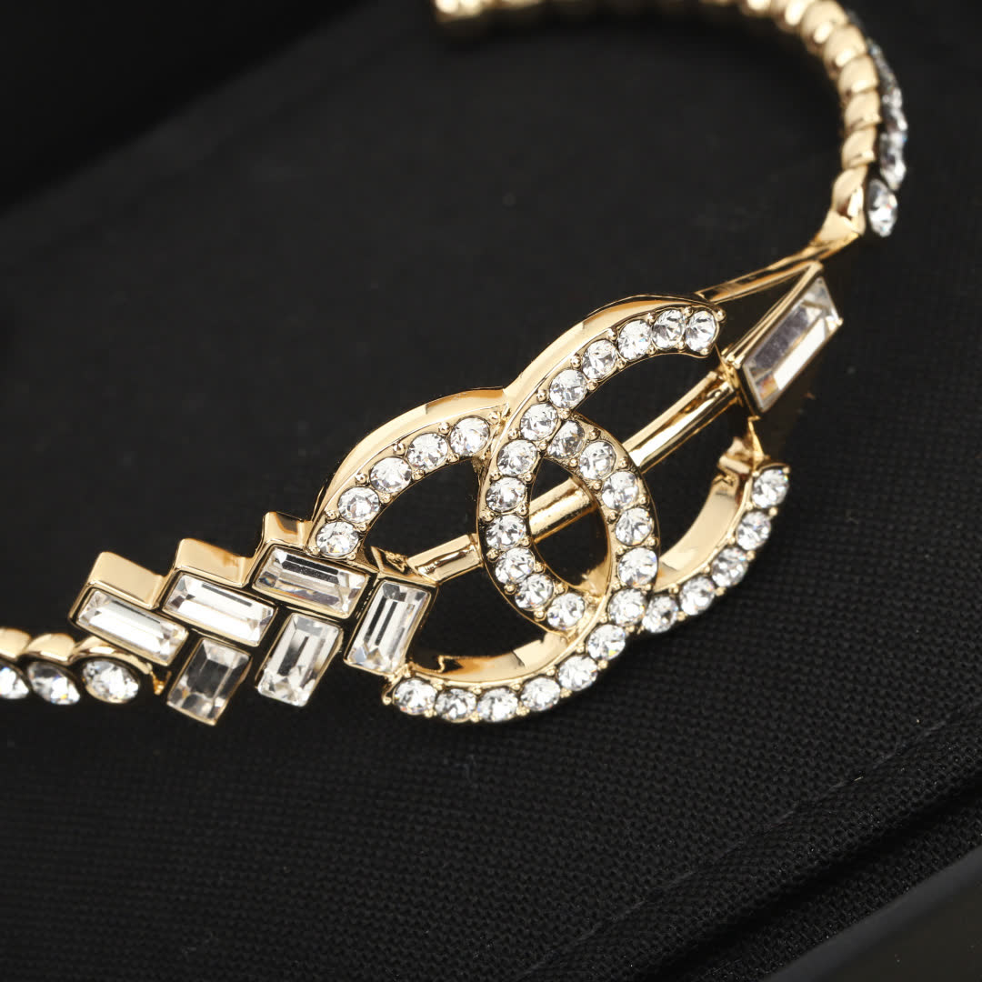 Chanel Gold Tone Bracelet with Diamonds
