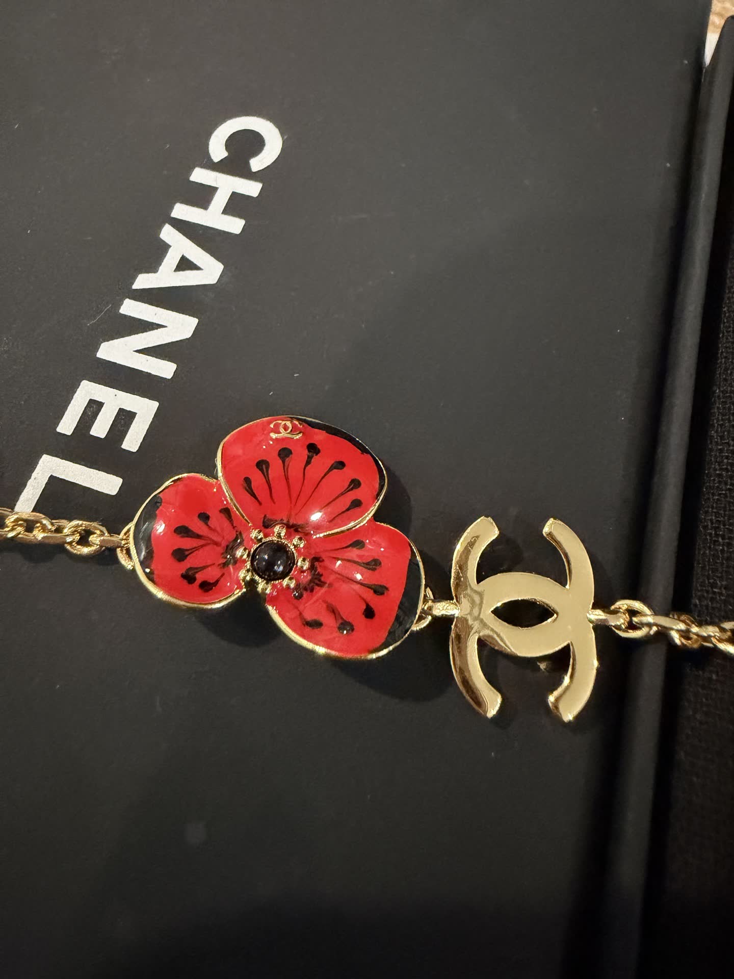Chanel Gold Tone Bracelet with Enamel Flower and Pearl