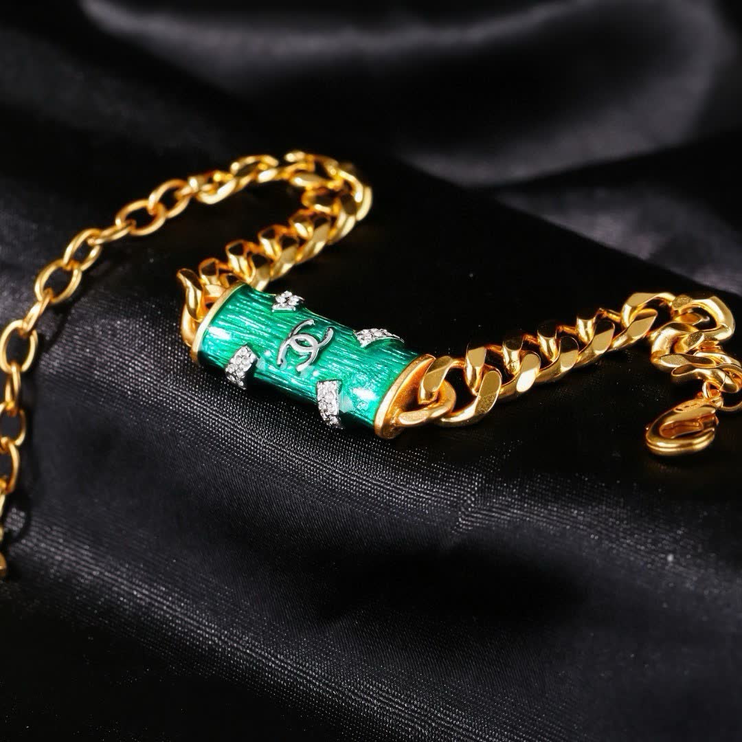 Chanel Gold Tone Bracelet with Green Enamel and Diamonds