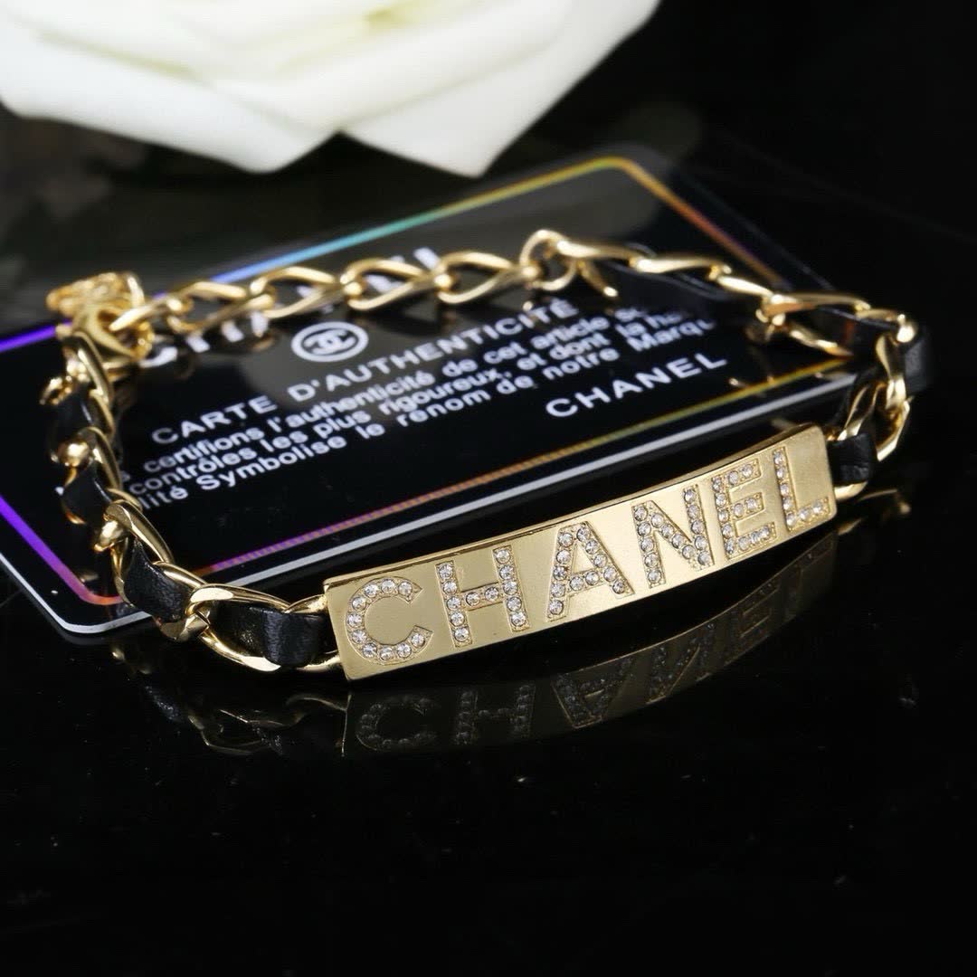 Chanel Gold Tone Crystal Logo Bracelet