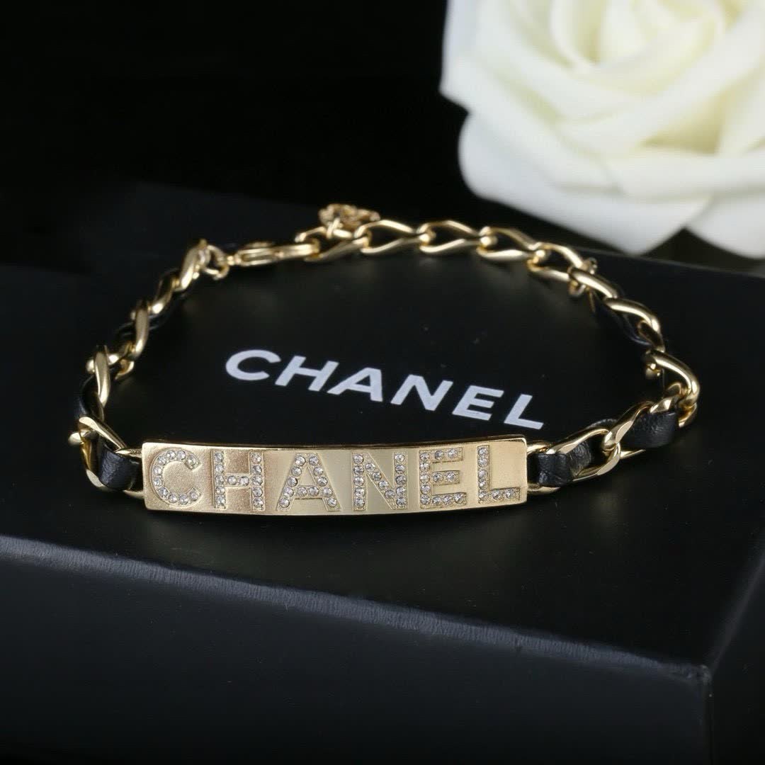 Chanel Gold Tone Crystal Logo Bracelet