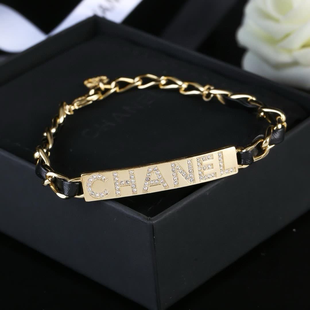 Chanel Gold Tone Crystal Logo Bracelet