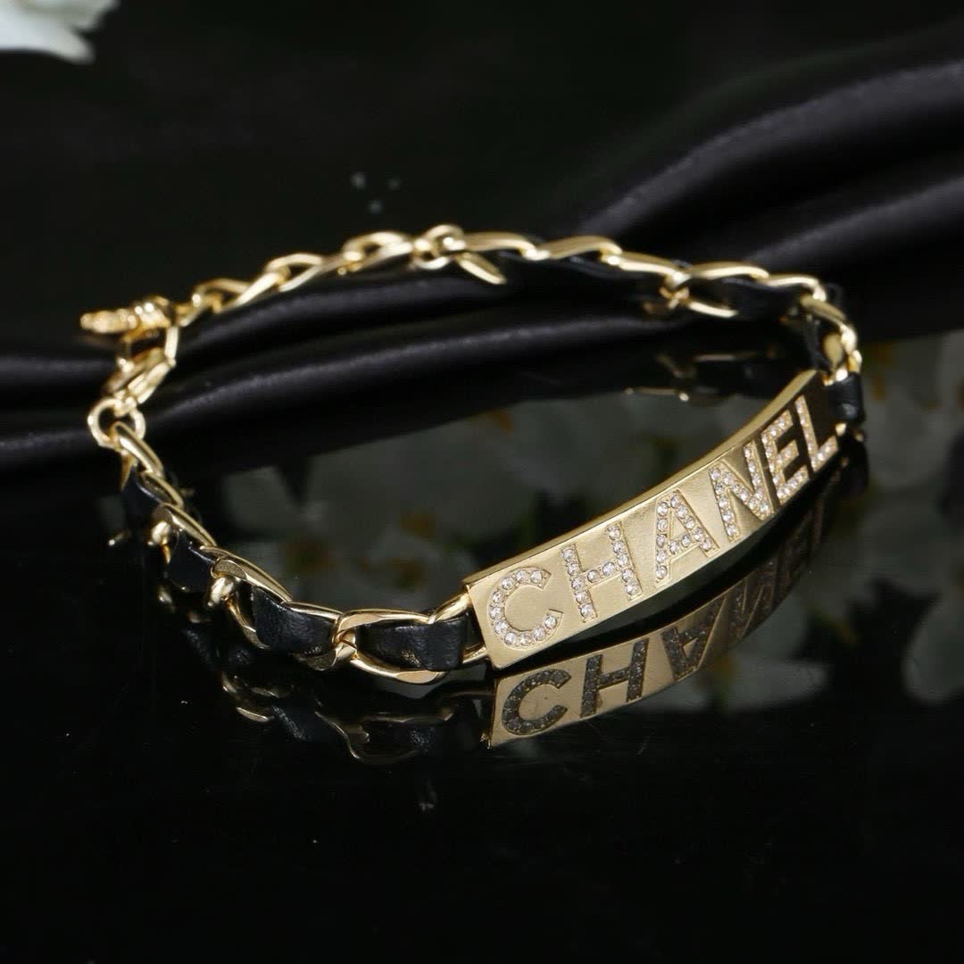 Chanel Gold Tone Crystal Logo Bracelet