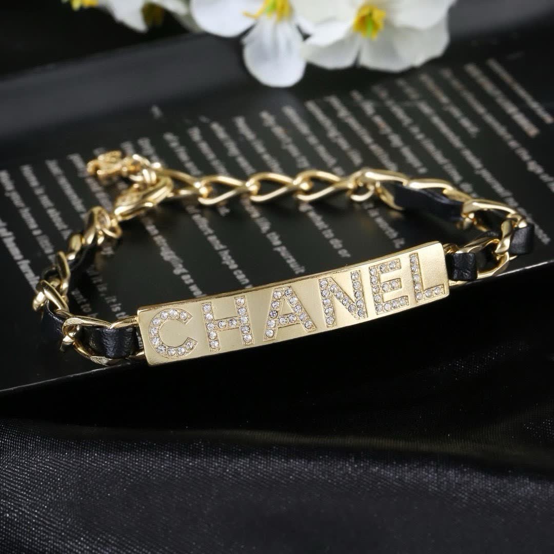 Chanel Gold Tone Crystal Logo Bracelet