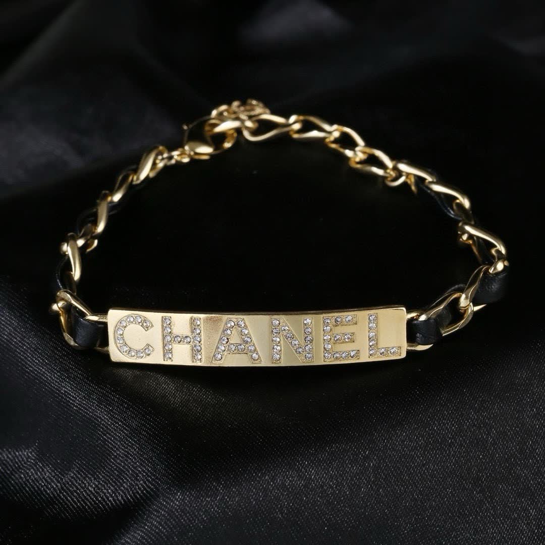 Chanel Gold Tone Crystal Logo Bracelet