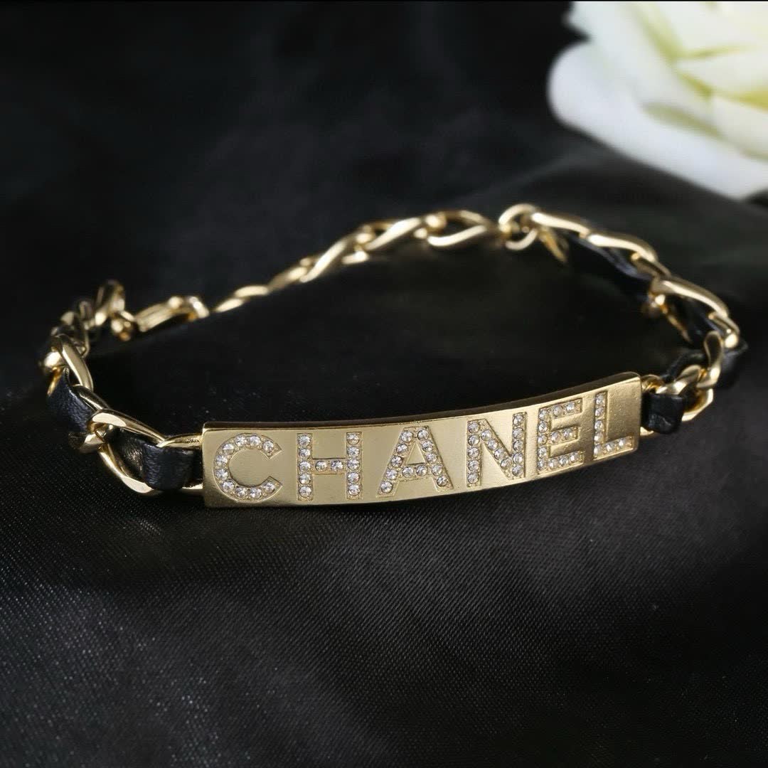Chanel Gold Tone Crystal Logo Bracelet