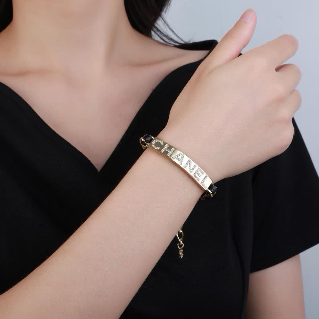 Chanel Gold Tone Crystal Logo Bracelet