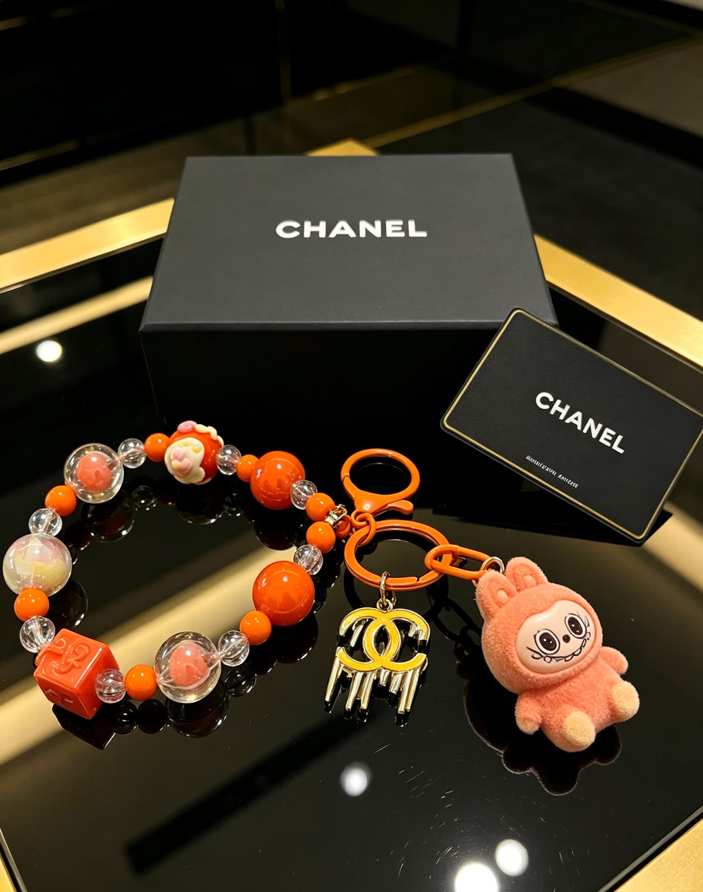 Chanel Beaded Charm Bracelet with Keychain Chanel Beaded Charm Bracelet with Keychain