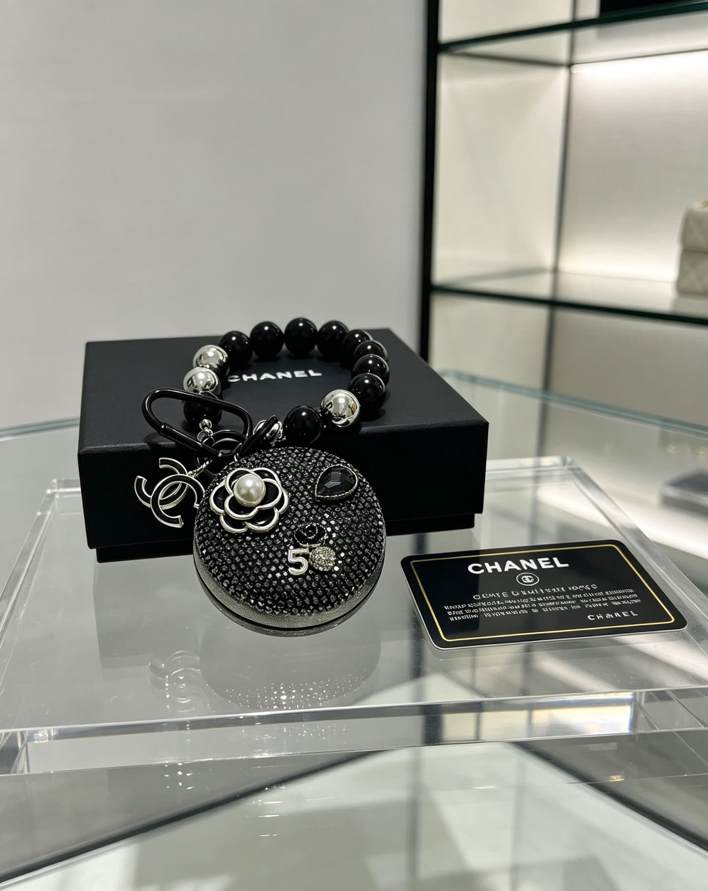 Chanel Black Beaded Bracelet with Crystal Flower Charm