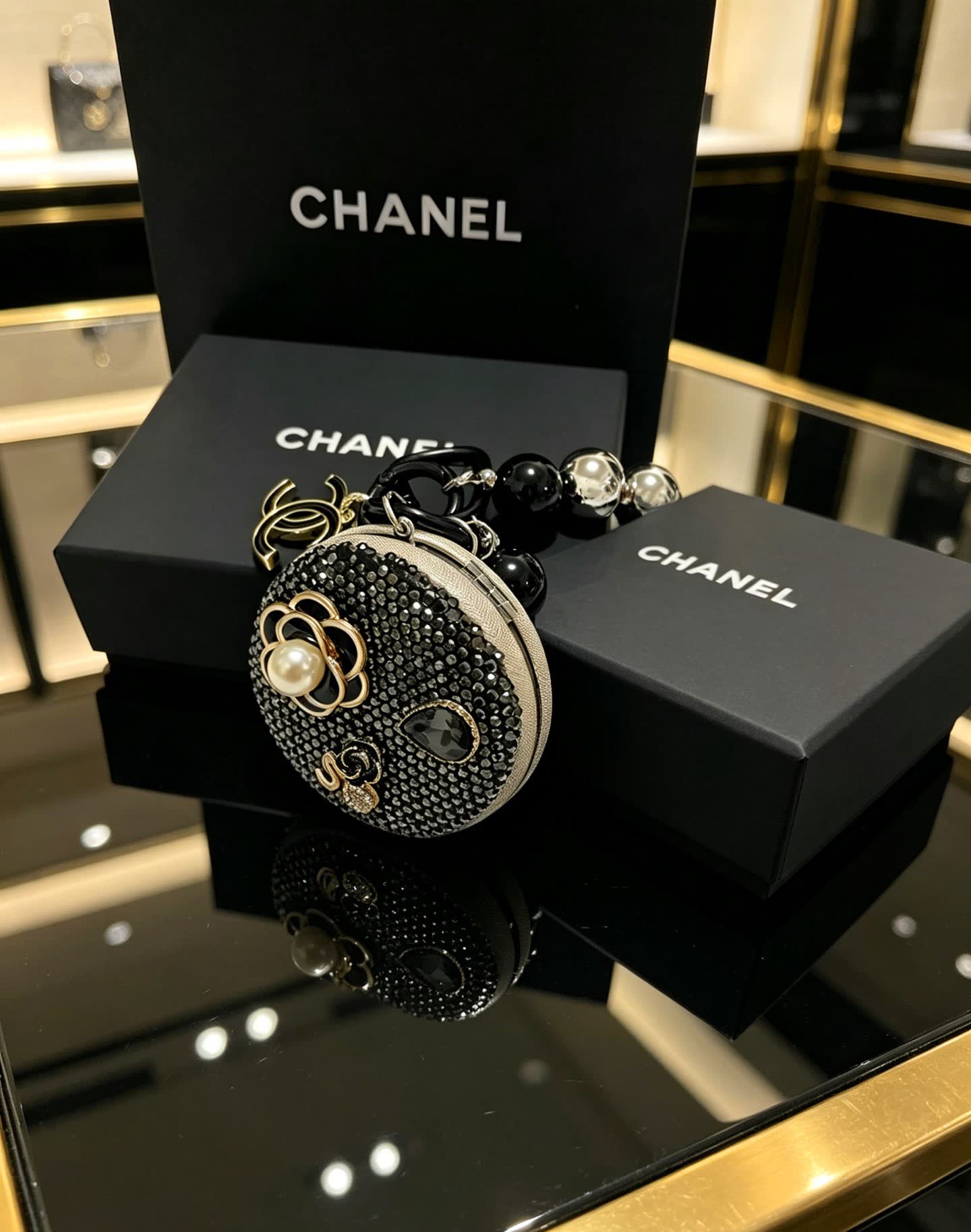 Chanel Black Beaded Bracelet with Crystal Flower Charm