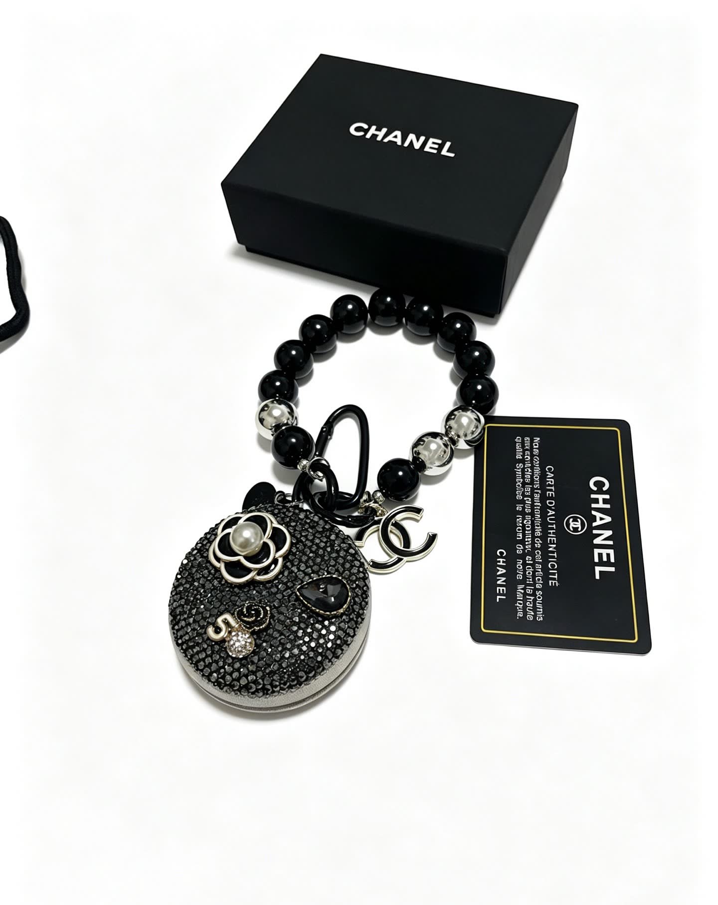 Chanel Black Beaded Bracelet with Crystal Flower Charm