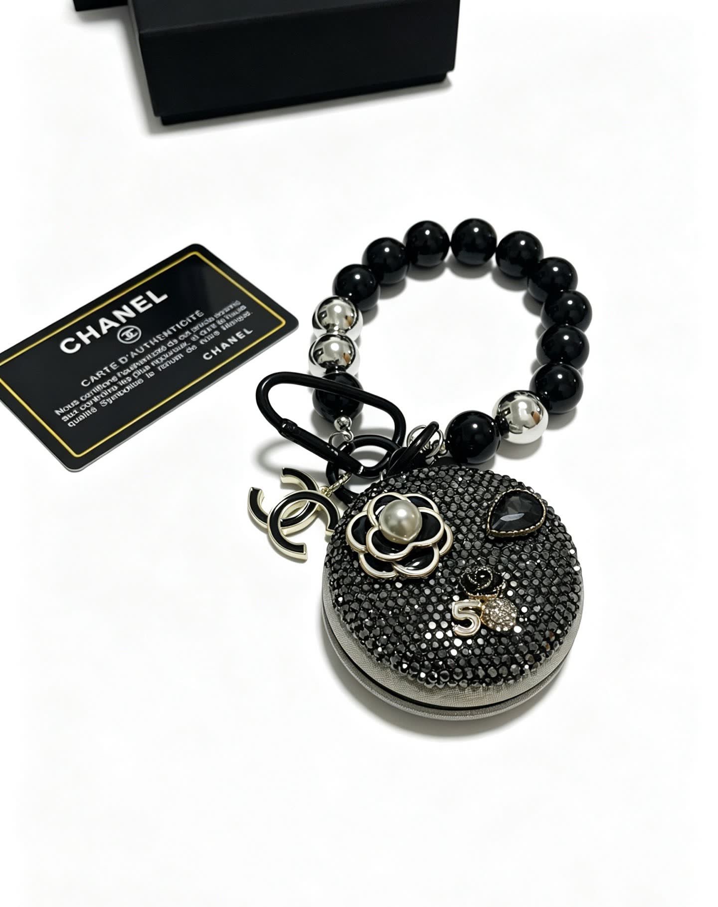 Chanel Black Beaded Bracelet with Crystal Flower Charm