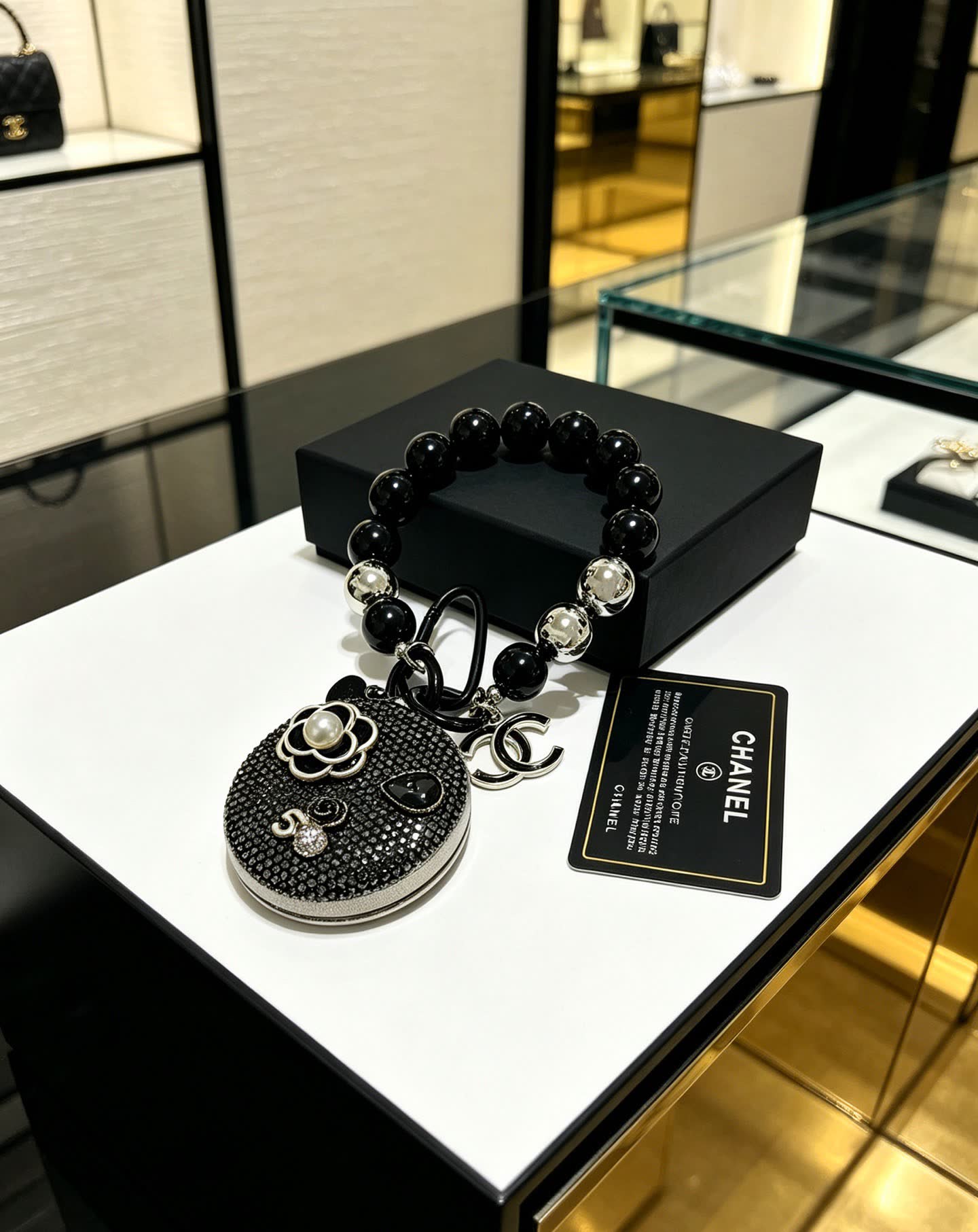 Chanel Black Beaded Bracelet with Crystal Flower Charm
