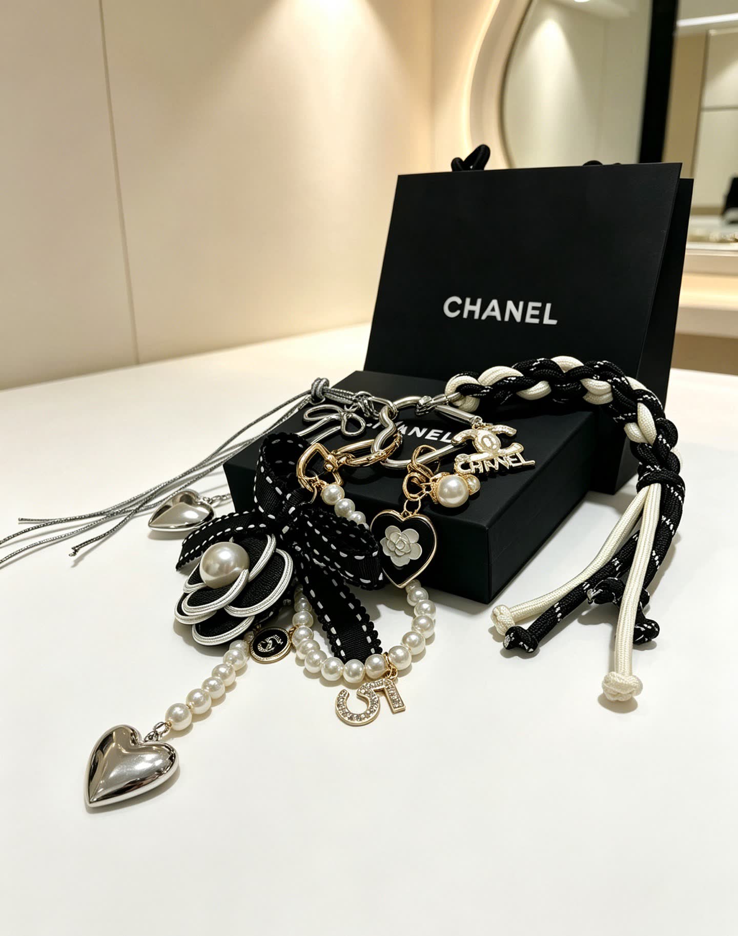 Chanel Black and White Braided Charm Bracelet