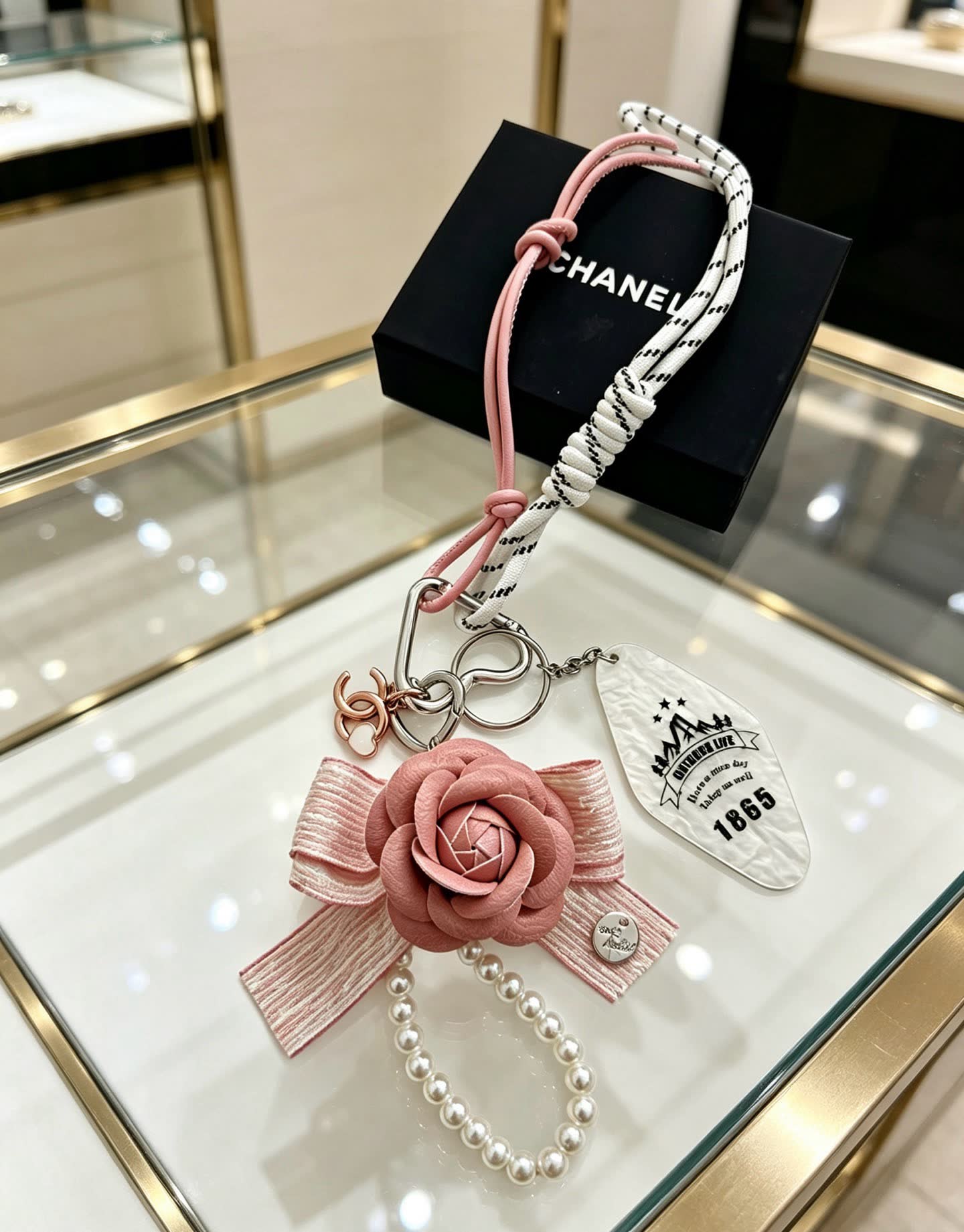 Chanel Pearl and Rose Charm Bracelet