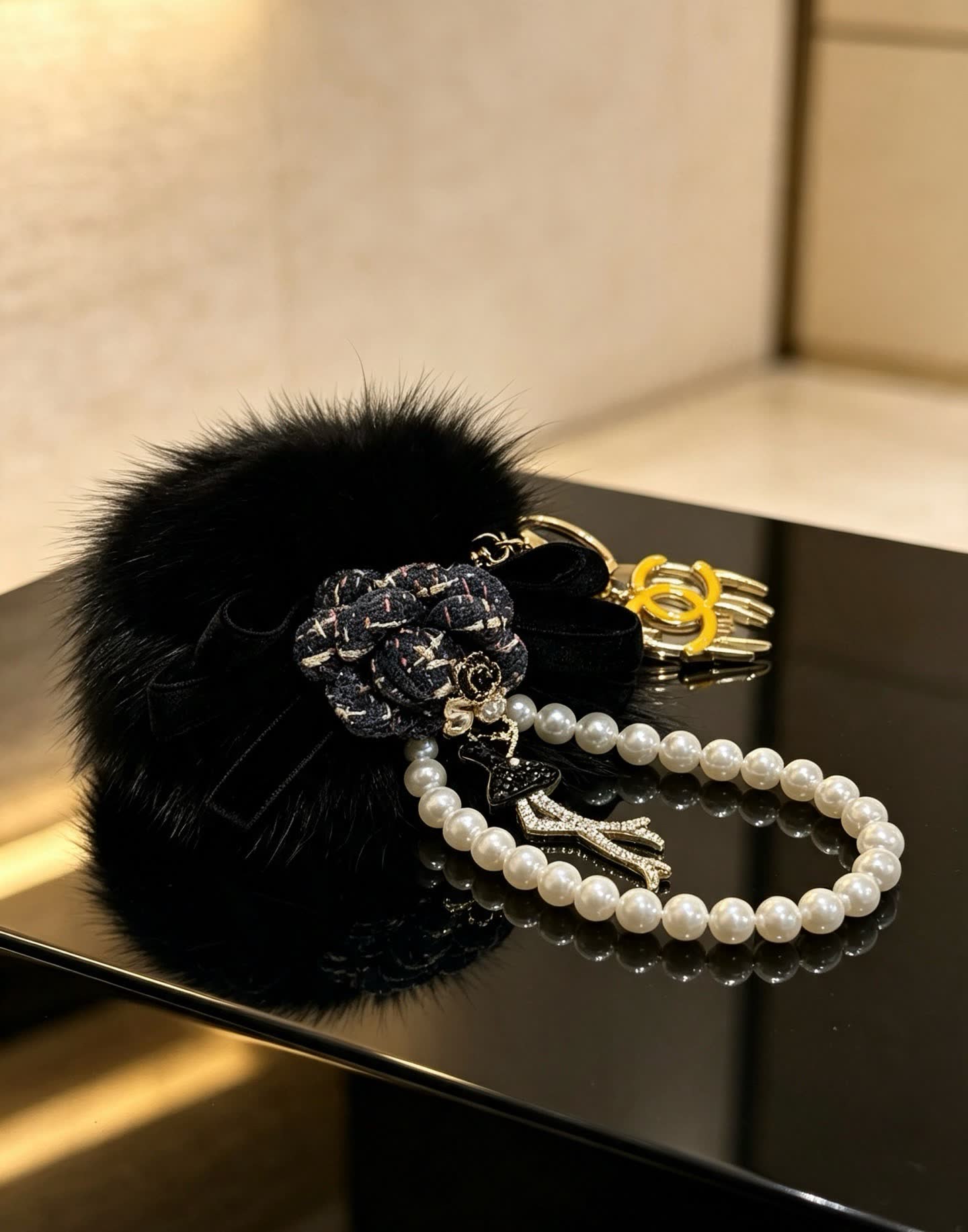 Chanel CC Keychain with Pearl Bracelet and Fur Pom-Pom