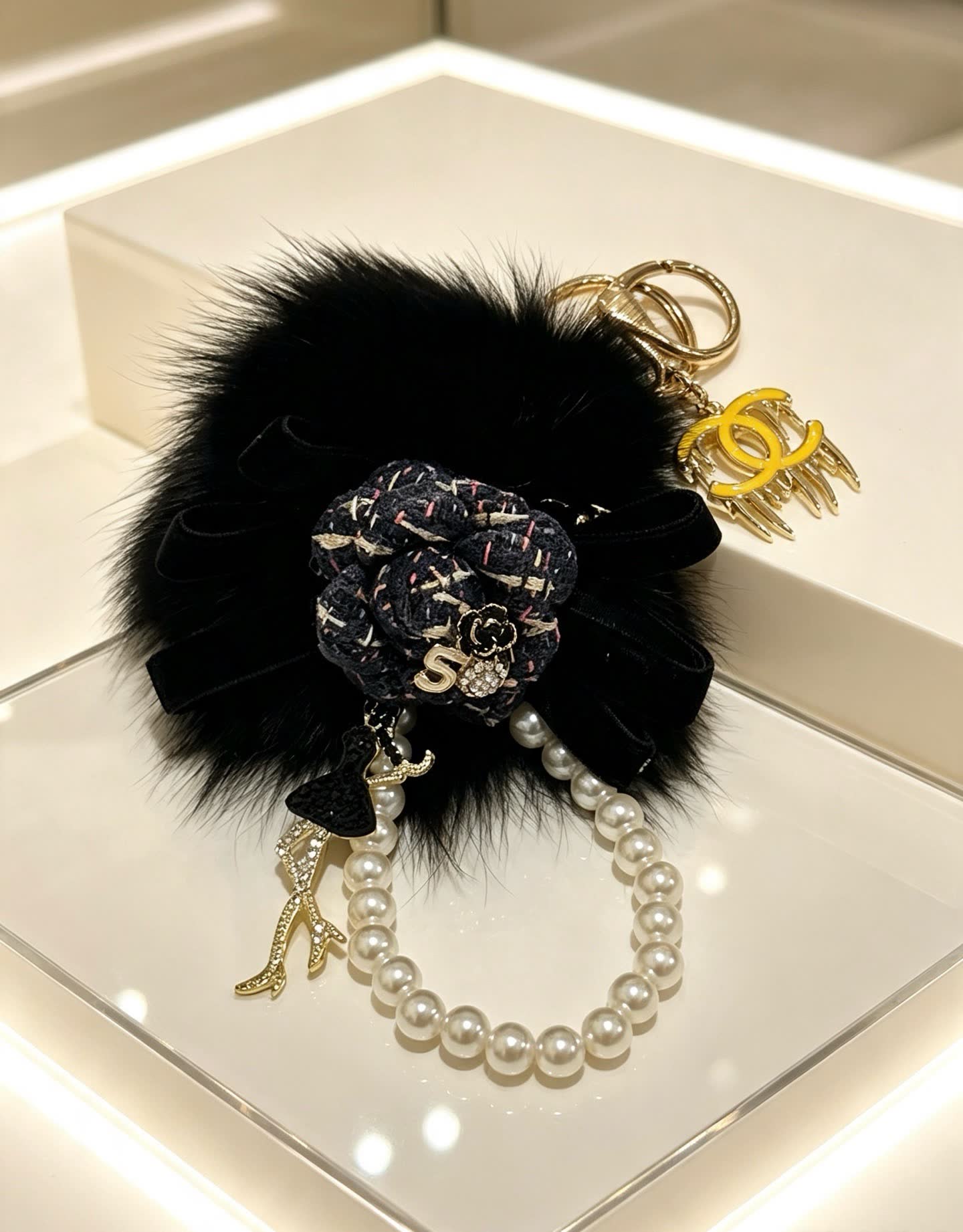 Chanel CC Keychain with Pearl Bracelet and Fur Pom-Pom