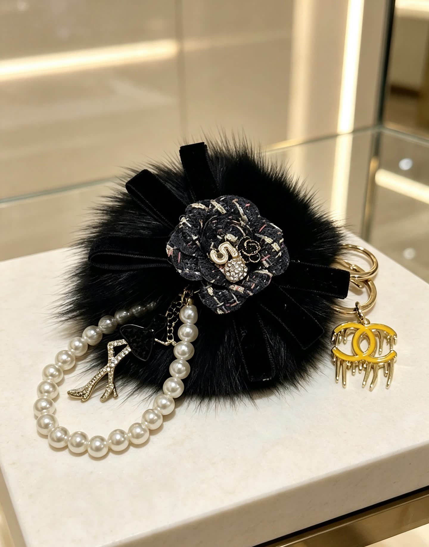 Chanel CC Keychain with Pearl Bracelet and Fur Pom-Pom