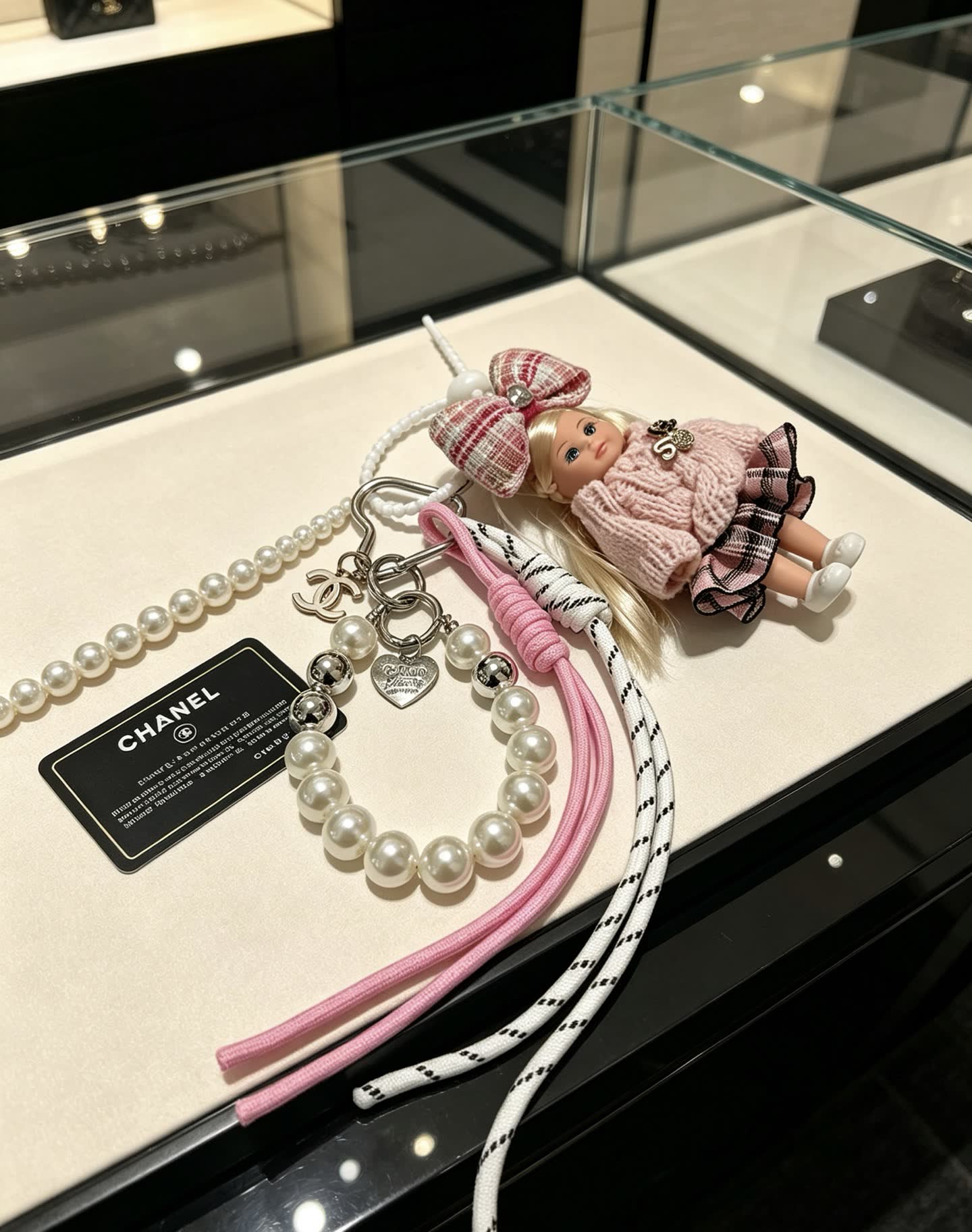 Chanel Pearl Charm Bracelet with Doll Keychain Chanel Pearl Charm Bracelet with Doll Keychain