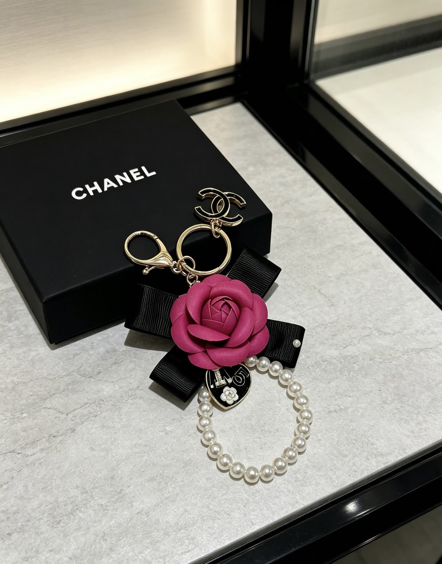 Chanel Pink Rose Keychain with Pearl Bracelet Chanel Pink Rose Keychain with Pearl Bracelet