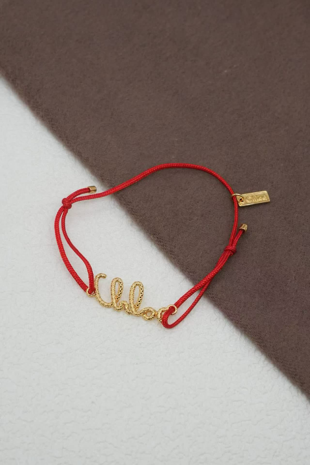 Chloe Chloé Red Rope Bracelet with Gold 'Chloé' Charm