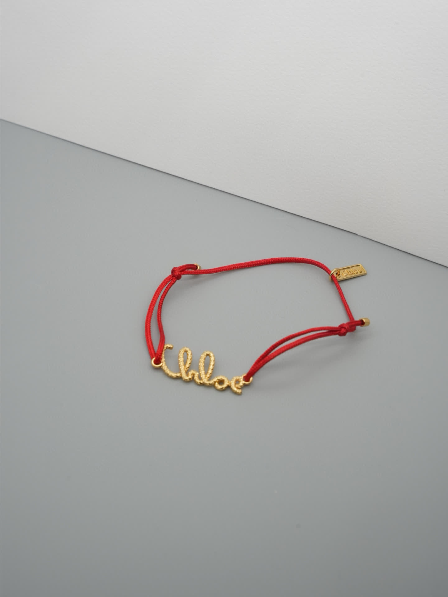 Chloe Chloé Red Rope Bracelet with Gold 'Chloé' Charm