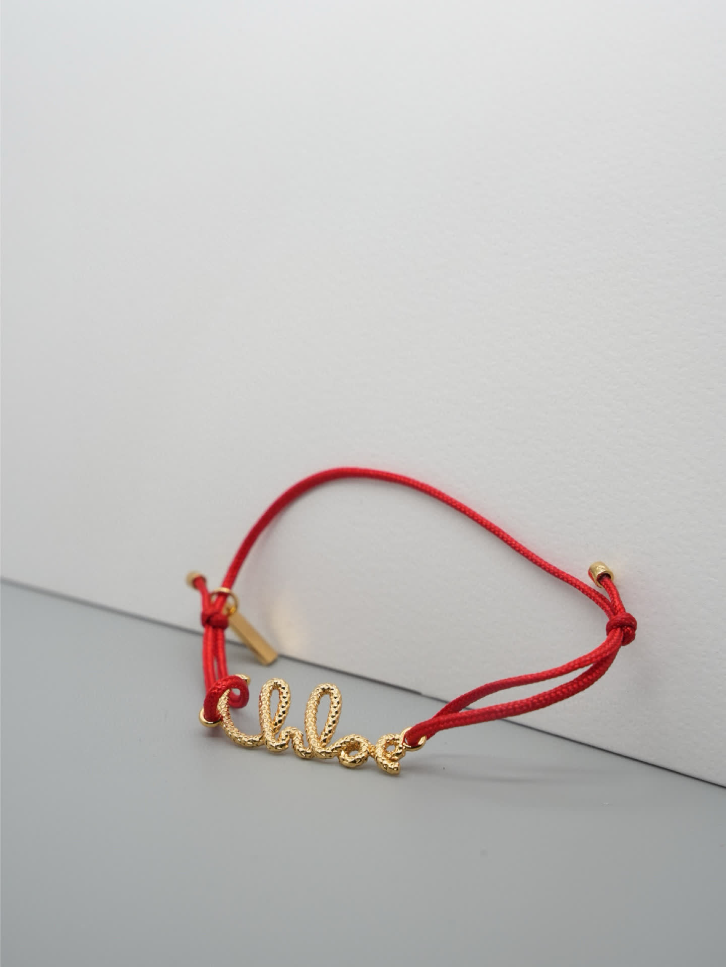 Chloe Chloé Red Rope Bracelet with Gold 'Chloé' Charm