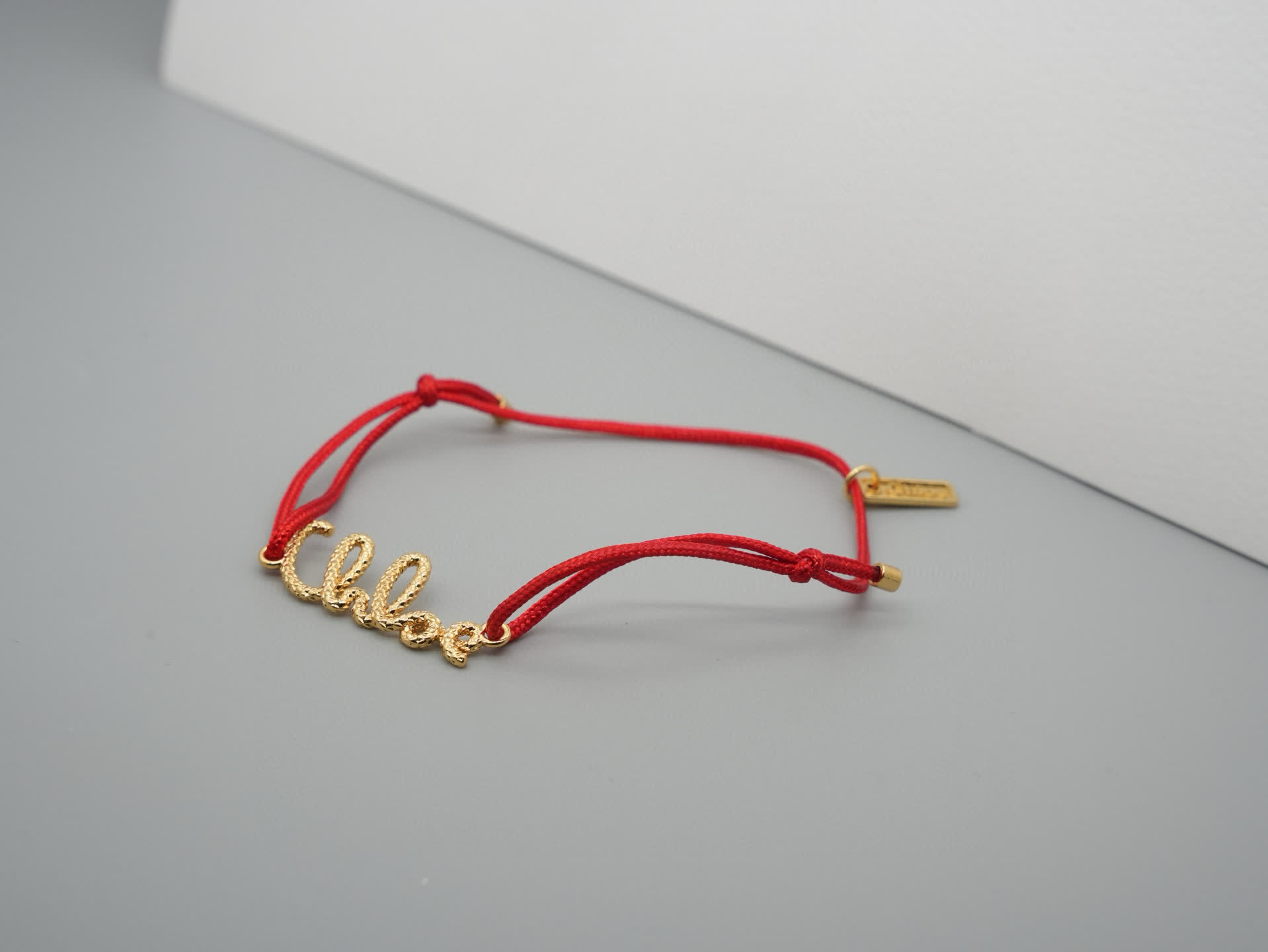 Chloe Chloé Red Rope Bracelet with Gold 'Chloé' Charm