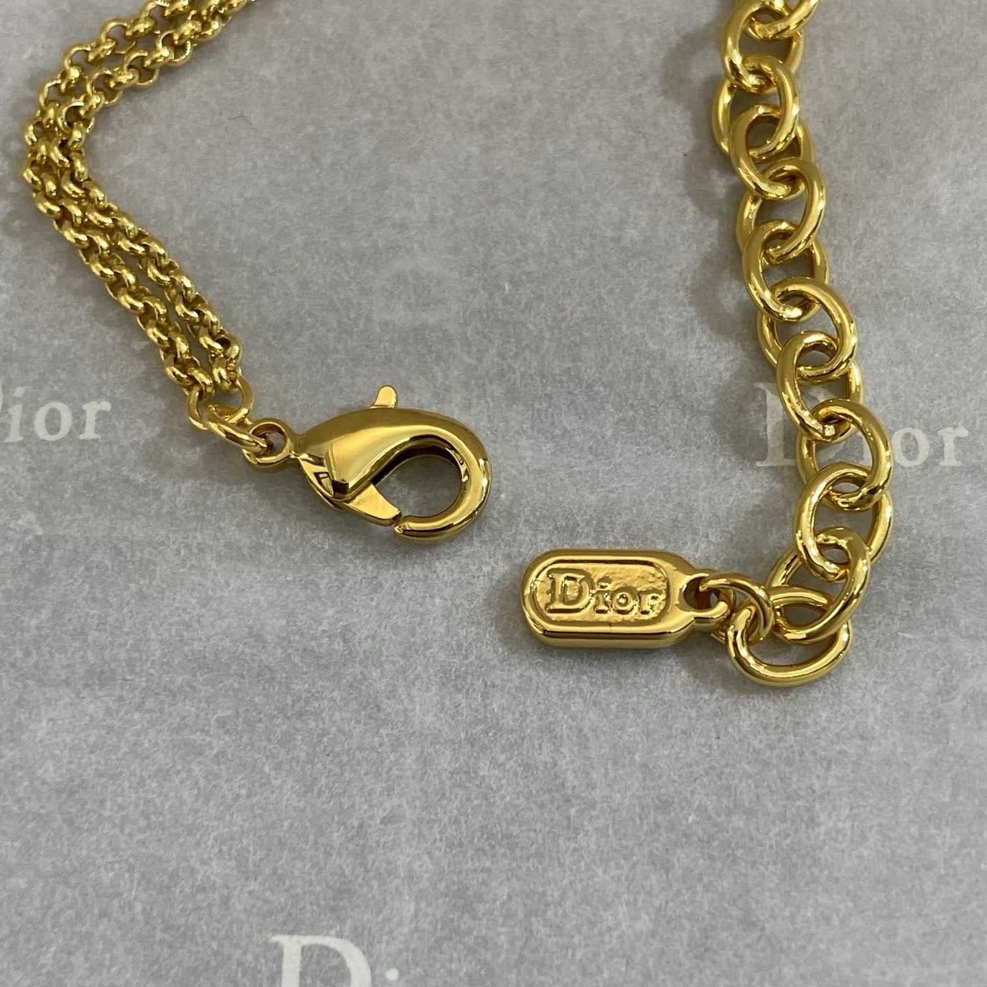 Dior Gold Tone Double Chain Bracelet with Pearl and Bow