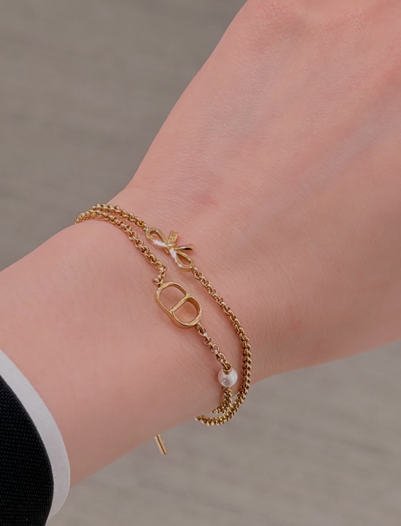 Dior Gold Tone Double Chain Bracelet with Pearl and Bow
