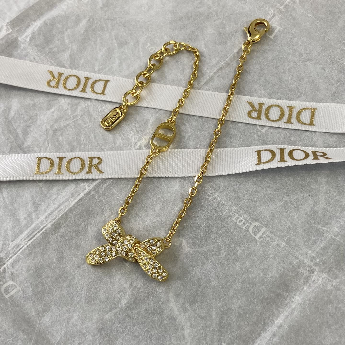 Dior Gold Tone Crystal Butterfly Charm Bracelet Dior Gold Tone Crystal Butterfly Charm Bracelet