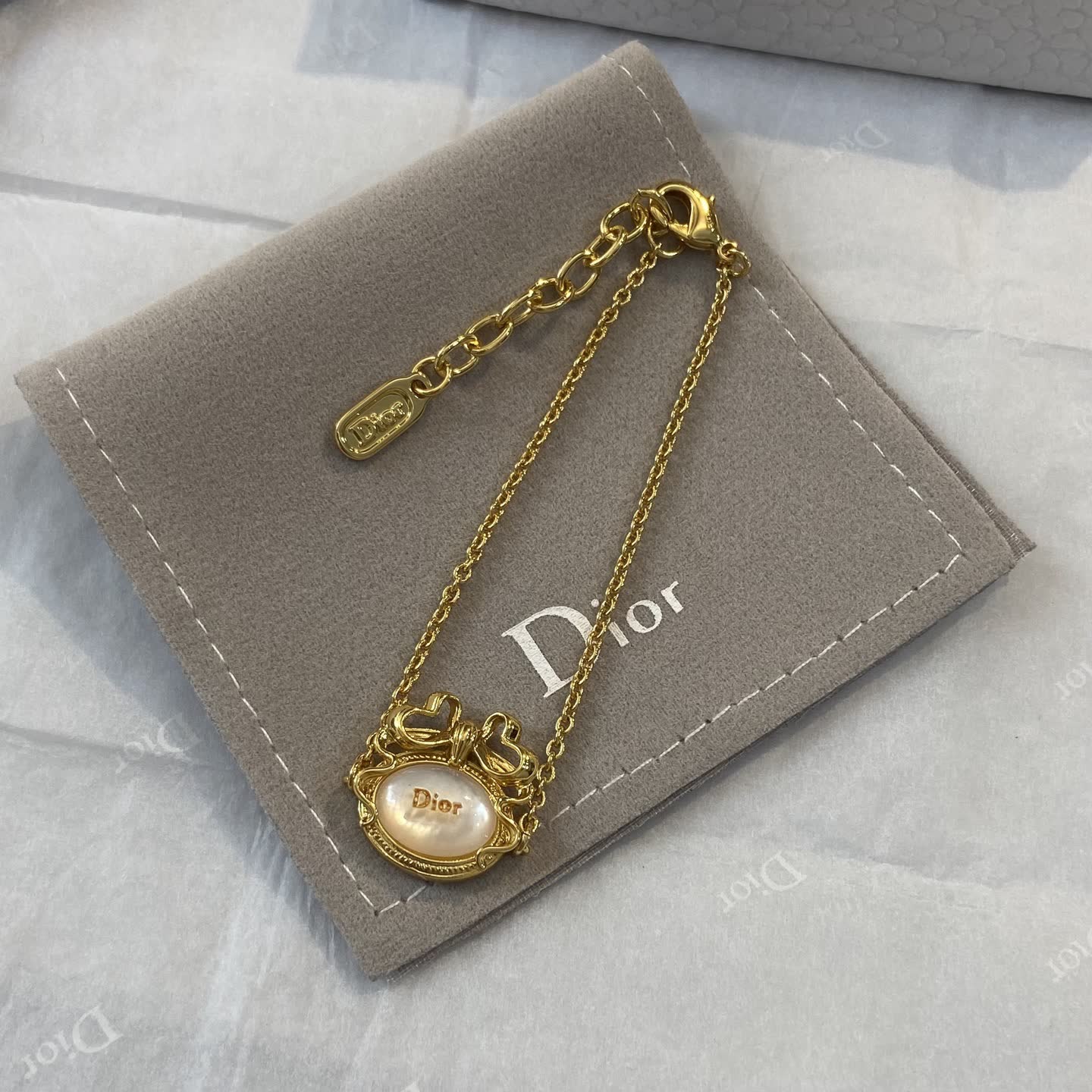 Dior Gold Tone Pearl Charm Bracelet