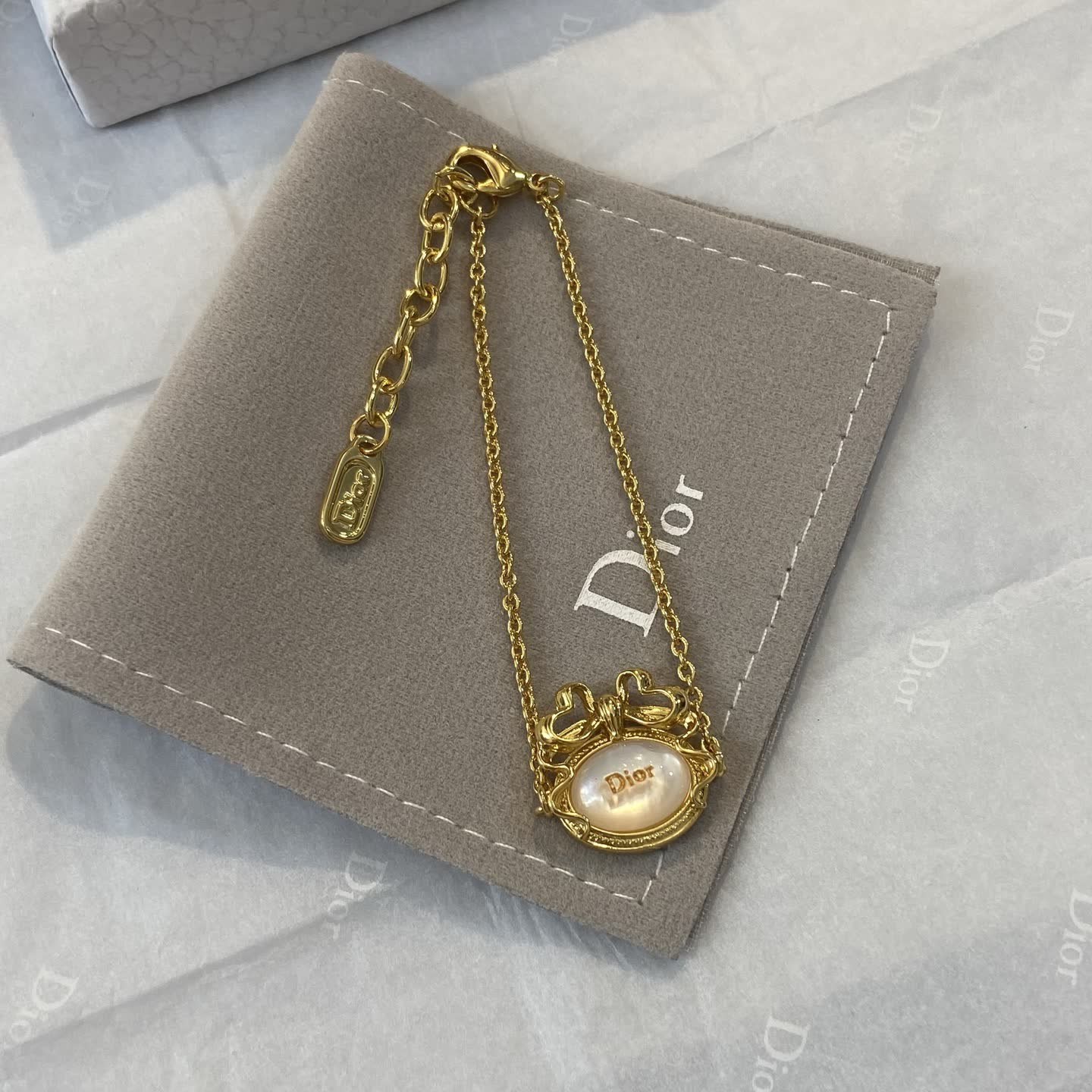 Dior Gold Tone Pearl Charm Bracelet