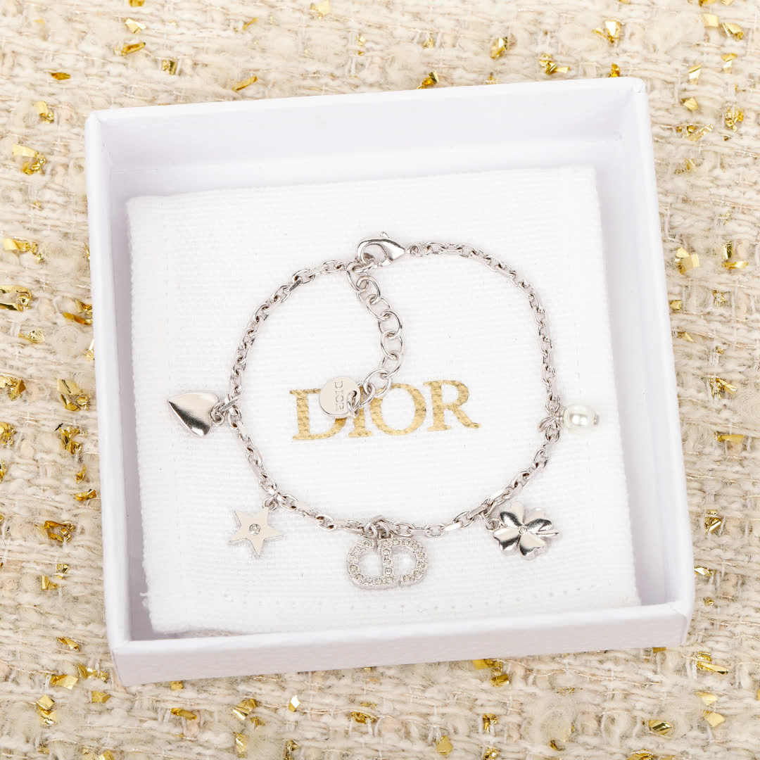 Van Cleef & Arpels Silver Charm Bracelet