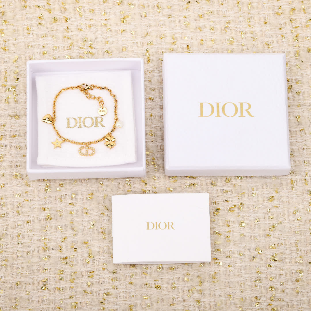 Van Cleef & Arpels Gold Tone Charm Bracelet Van Cleef & Arpels Gold Tone Charm Bracelet