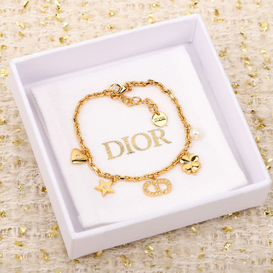 Van Cleef & Arpels Gold Tone Charm Bracelet
