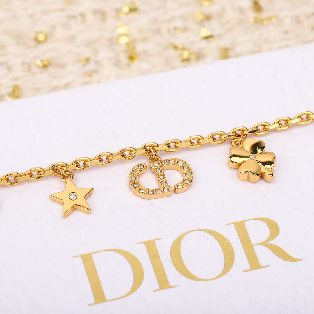 Van Cleef & Arpels Gold Tone Charm Bracelet