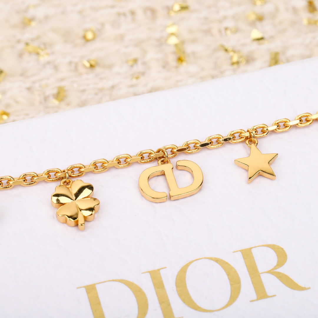 Van Cleef & Arpels Gold Tone Charm Bracelet